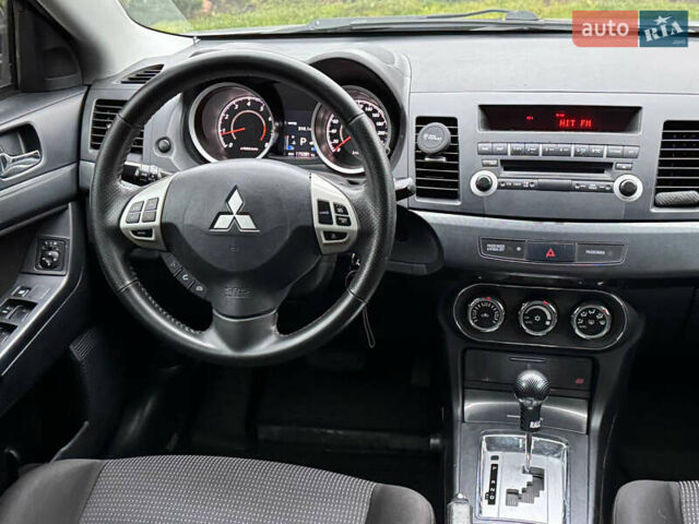 Сірий Міцубісі Lancer, об'ємом двигуна 2 л та пробігом 173 тис. км за 7200 $, фото 18 на Automoto.ua