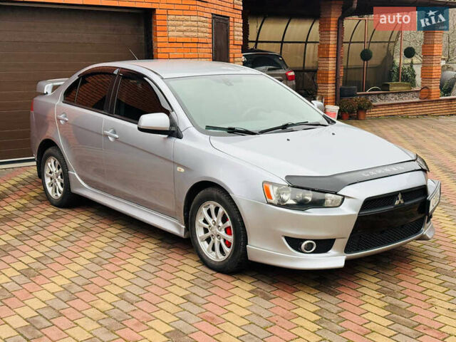 Сірий Міцубісі Lancer, об'ємом двигуна 2 л та пробігом 173 тис. км за 7200 $, фото 5 на Automoto.ua
