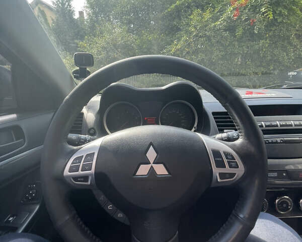 Мицубиси Лансер 2011 в Львове на Automoto.ua Серый Мицубиси Лансер, объемом двигателя 2 л и пробегом 104 тыс. км за 10500 $, фото 55 на Automoto.ua