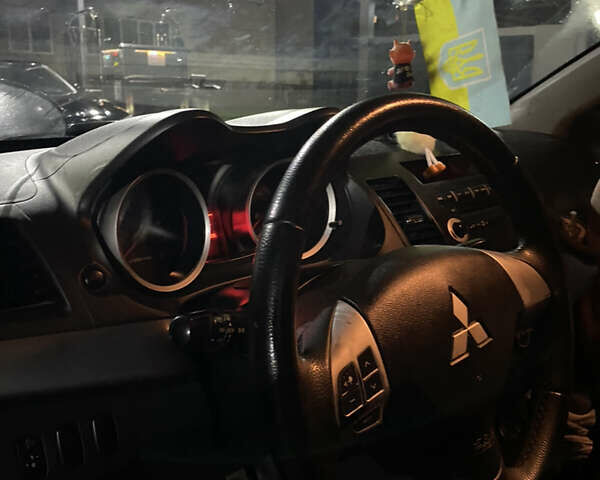 Серый Мицубиси Лансер, объемом двигателя 1.5 л и пробегом 227 тыс. км за 7300 $, фото 20 на Automoto.ua