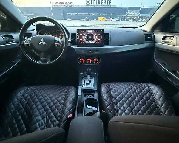 Серый Мицубиси Лансер, объемом двигателя 2 л и пробегом 191 тыс. км за 7900 $, фото 8 на Automoto.ua