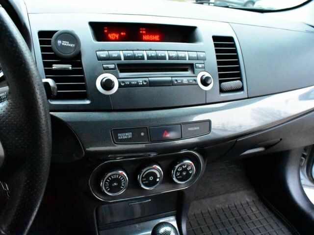 Сірий Міцубісі Lancer, об'ємом двигуна 2 л та пробігом 178 тис. км за 7400 $, фото 15 на Automoto.ua
