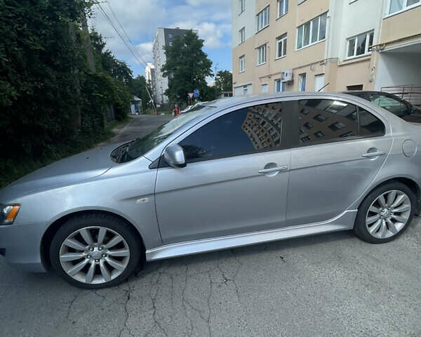 Мицубиси Лансер 2011 в Львове на Automoto.ua Серый Мицубиси Лансер, объемом двигателя 2 л и пробегом 104 тыс. км за 10500 $, фото 26 на Automoto.ua