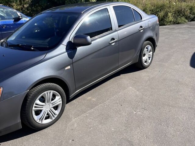 Сірий Міцубісі Lancer, об'ємом двигуна 1.5 л та пробігом 1 тис. км за 5450 $, фото 2 на Automoto.ua