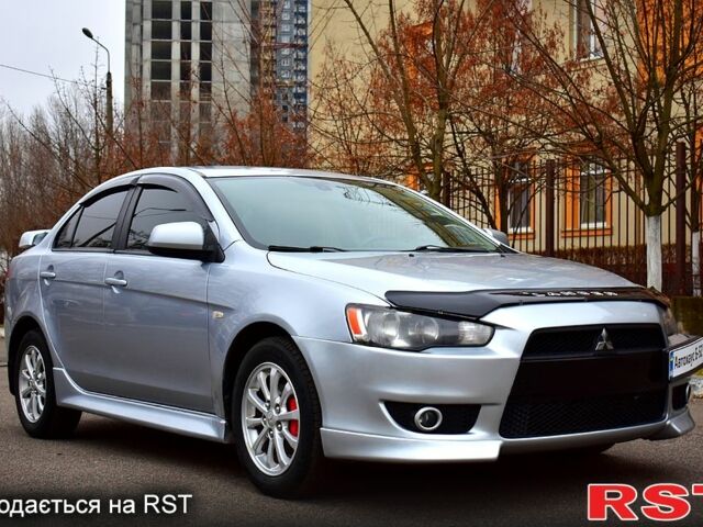 Серый Мицубиси Лансер, объемом двигателя 2 л и пробегом 178 тыс. км за 7400 $, фото 5 на Automoto.ua