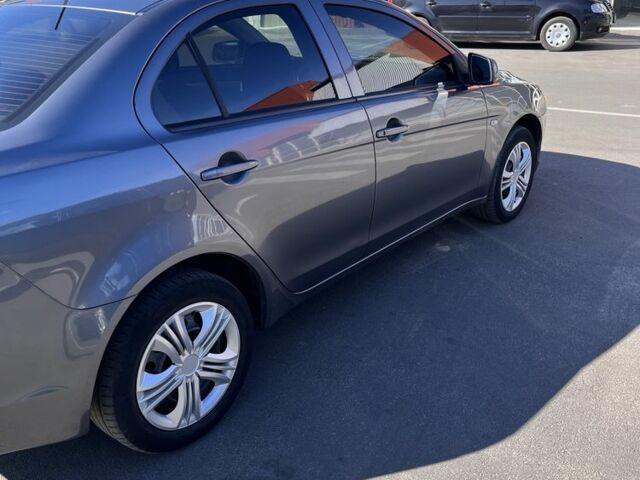Сірий Міцубісі Lancer, об'ємом двигуна 1.5 л та пробігом 1 тис. км за 5450 $, фото 3 на Automoto.ua