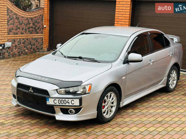 Сірий Міцубісі Lancer, об'ємом двигуна 2 л та пробігом 173 тис. км за 7200 $, фото 10 на Automoto.ua