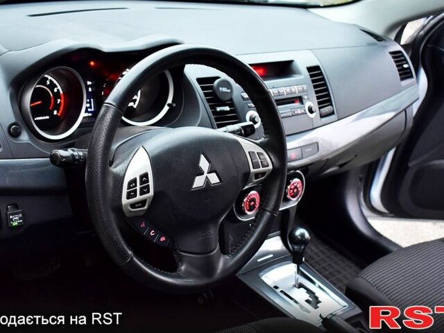 Серый Мицубиси Лансер, объемом двигателя 2 л и пробегом 178 тыс. км за 7400 $, фото 7 на Automoto.ua