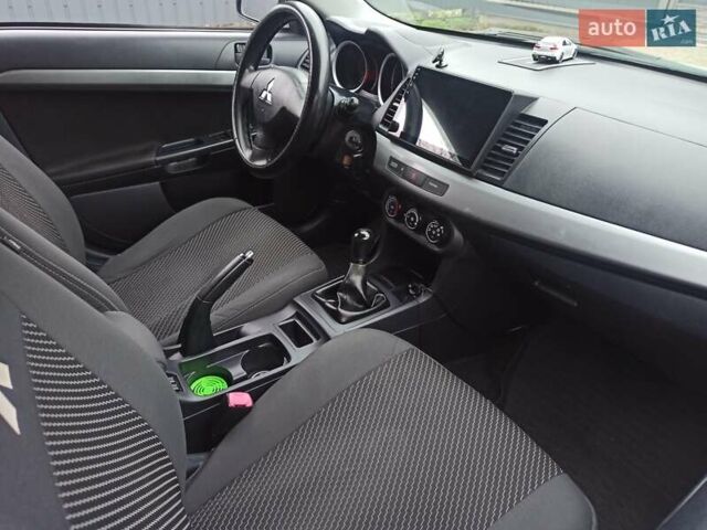 Сірий Міцубісі Lancer, об'ємом двигуна 1.5 л та пробігом 255 тис. км за 7500 $, фото 9 на Automoto.ua