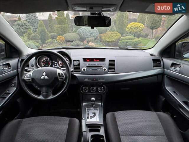 Сірий Міцубісі Lancer, об'ємом двигуна 2 л та пробігом 173 тис. км за 7200 $, фото 17 на Automoto.ua