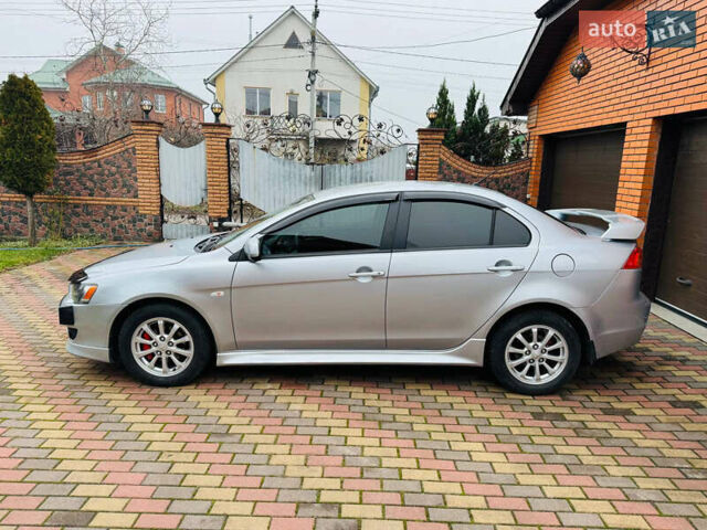 Сірий Міцубісі Lancer, об'ємом двигуна 2 л та пробігом 173 тис. км за 7200 $, фото 6 на Automoto.ua