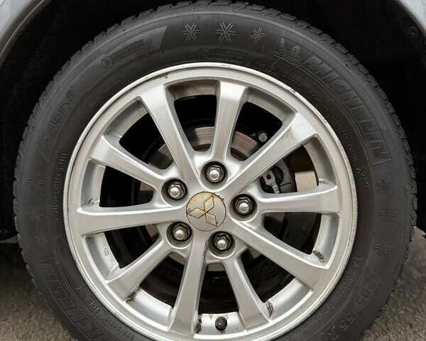 Сірий Міцубісі Lancer, об'ємом двигуна 1.6 л та пробігом 220 тис. км за 6900 $, фото 9 на Automoto.ua