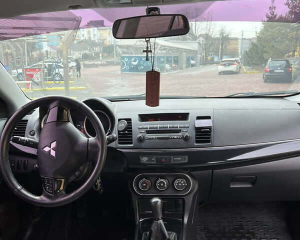 Сірий Міцубісі Lancer, об'ємом двигуна 1.59 л та пробігом 270 тис. км за 5500 $, фото 8 на Automoto.ua