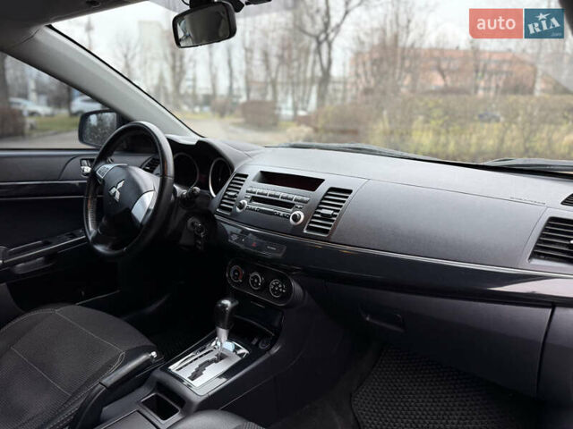 Сірий Міцубісі Lancer, об'ємом двигуна 1.6 л та пробігом 220 тис. км за 6900 $, фото 4 на Automoto.ua