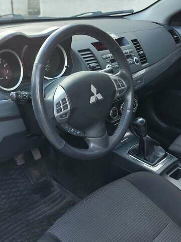 Мицубиси Лансер 2012 в Кривом Озере на Automoto.ua Серый Мицубиси Лансер, объемом двигателя 2 л и пробегом 58 тыс. км за 9500 $, фото 5 на Automoto.ua