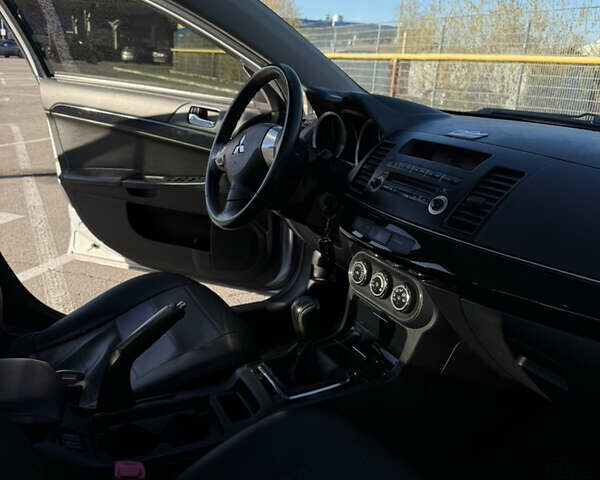 Серый Мицубиси Лансер, объемом двигателя 1.6 л и пробегом 188 тыс. км за 7400 $, фото 20 на Automoto.ua