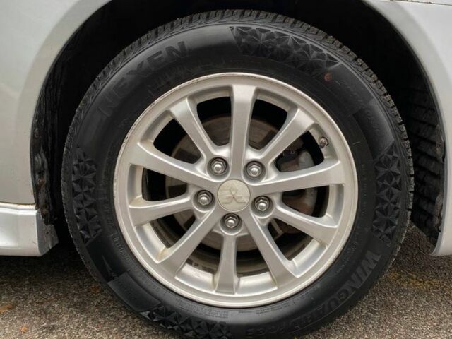 Сірий Міцубісі Lancer, об'ємом двигуна 2 л та пробігом 170 тис. км за 7500 $, фото 17 на Automoto.ua