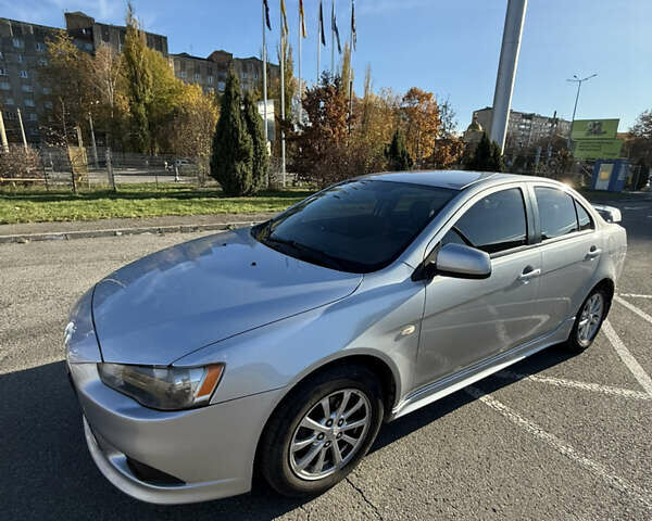 Серый Мицубиси Лансер, объемом двигателя 1.6 л и пробегом 188 тыс. км за 7400 $, фото 1 на Automoto.ua