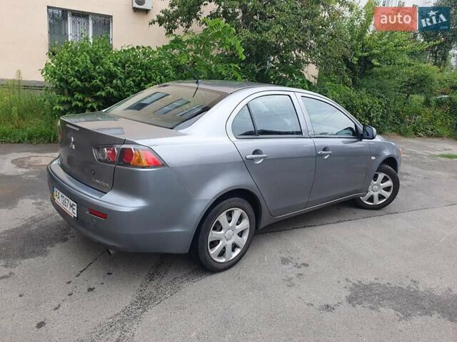 Серый Мицубиси Лансер, объемом двигателя 1.59 л и пробегом 265 тыс. км за 5950 $, фото 7 на Automoto.ua