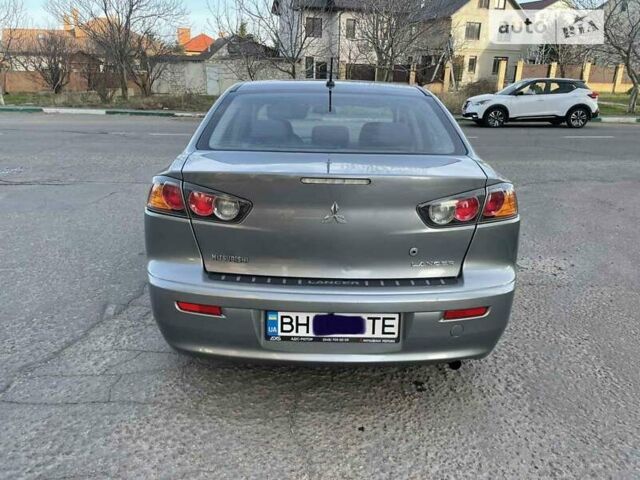 Сірий Міцубісі Lancer, об'ємом двигуна 2 л та пробігом 143 тис. км за 7750 $, фото 4 на Automoto.ua