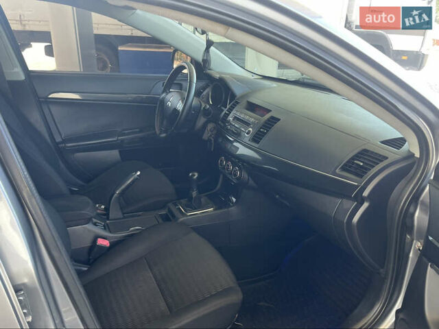 Серый Мицубиси Лансер, объемом двигателя 1.6 л и пробегом 183 тыс. км за 7400 $, фото 12 на Automoto.ua