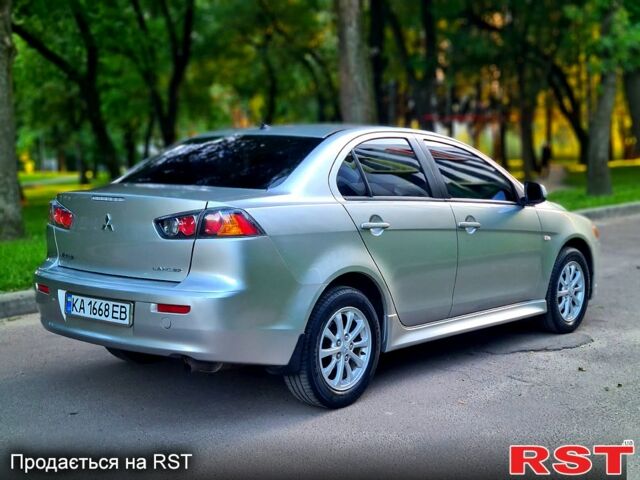 Сірий Міцубісі Lancer, об'ємом двигуна 1.8 л та пробігом 115 тис. км за 8200 $, фото 5 на Automoto.ua
