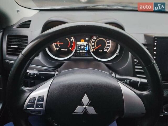 Серый Мицубиси Лансер, объемом двигателя 1.6 л и пробегом 212 тыс. км за 8619 $, фото 6 на Automoto.ua