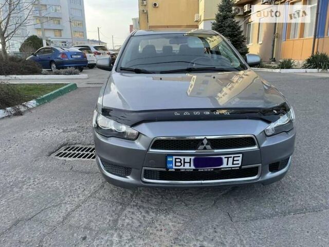 Сірий Міцубісі Lancer, об'ємом двигуна 2 л та пробігом 143 тис. км за 7750 $, фото 1 на Automoto.ua