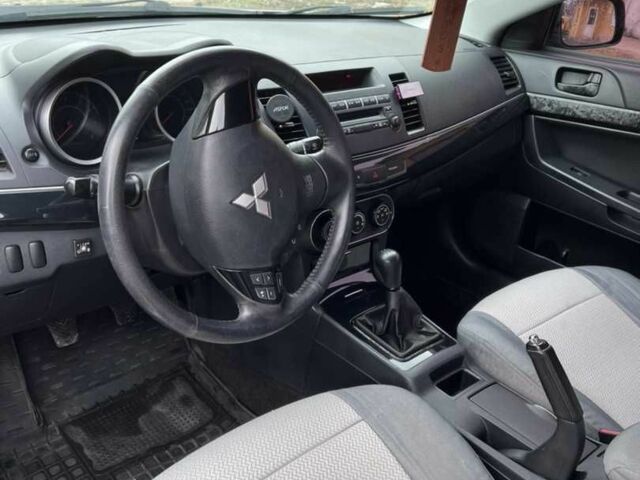 Серый Мицубиси Лансер, объемом двигателя 1.6 л и пробегом 270 тыс. км за 6423 $, фото 9 на Automoto.ua