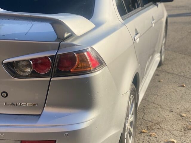 Серый Мицубиси Лансер, объемом двигателя 1.6 л и пробегом 226 тыс. км за 7200 $, фото 2 на Automoto.ua