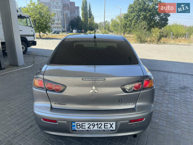 Серый Мицубиси Лансер, объемом двигателя 1.6 л и пробегом 183 тыс. км за 7400 $, фото 3 на Automoto.ua