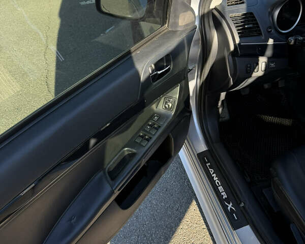 Серый Мицубиси Лансер, объемом двигателя 1.6 л и пробегом 188 тыс. км за 7400 $, фото 21 на Automoto.ua