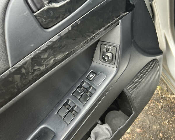 Сірий Міцубісі Lancer, об'ємом двигуна 1.59 л та пробігом 270 тис. км за 5500 $, фото 12 на Automoto.ua