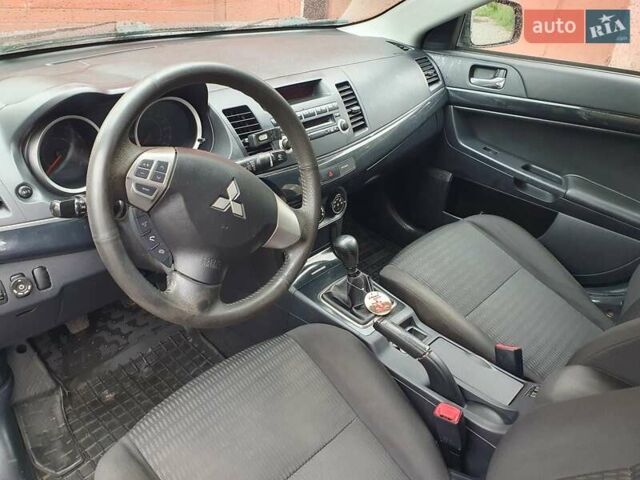 Серый Мицубиси Лансер, объемом двигателя 1.59 л и пробегом 265 тыс. км за 5950 $, фото 10 на Automoto.ua
