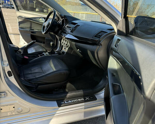 Серый Мицубиси Лансер, объемом двигателя 1.6 л и пробегом 188 тыс. км за 7400 $, фото 15 на Automoto.ua