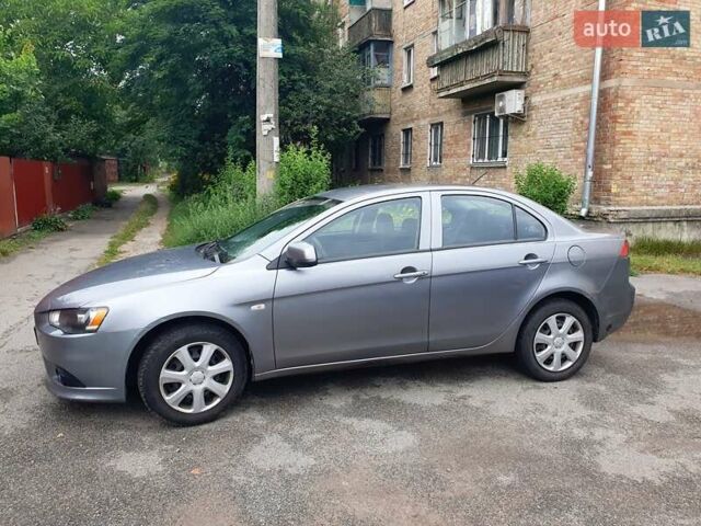 Серый Мицубиси Лансер, объемом двигателя 1.59 л и пробегом 265 тыс. км за 5950 $, фото 5 на Automoto.ua