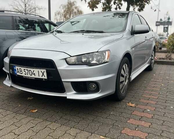 Серый Мицубиси Лансер, объемом двигателя 1.6 л и пробегом 212 тыс. км за 8619 $, фото 7 на Automoto.ua