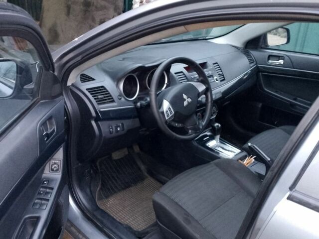 Серый Мицубиси Лансер, объемом двигателя 1.6 л и пробегом 140 тыс. км за 6500 $, фото 6 на Automoto.ua