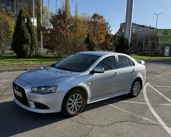 Серый Мицубиси Лансер, объемом двигателя 1.6 л и пробегом 188 тыс. км за 7400 $, фото 8 на Automoto.ua