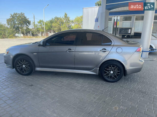 Серый Мицубиси Лансер, объемом двигателя 1.6 л и пробегом 183 тыс. км за 7400 $, фото 5 на Automoto.ua