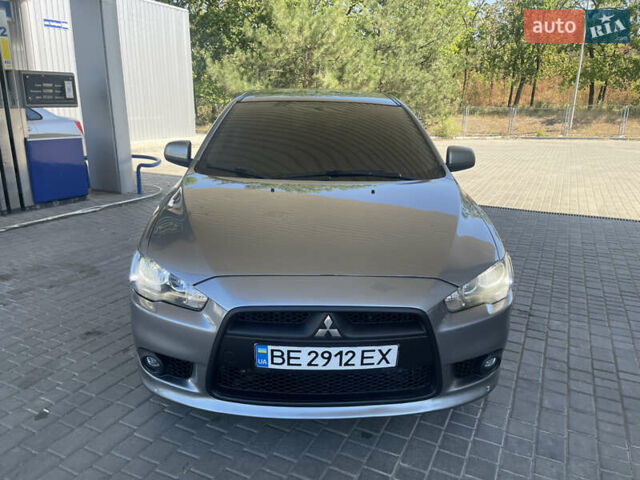 Серый Мицубиси Лансер, объемом двигателя 1.6 л и пробегом 183 тыс. км за 7400 $, фото 8 на Automoto.ua