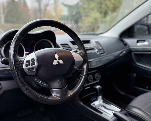 Сірий Міцубісі Lancer, об'ємом двигуна 1.6 л та пробігом 220 тис. км за 6900 $, фото 5 на Automoto.ua