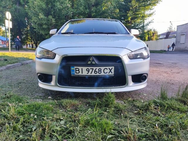 Сірий Міцубісі Lancer, об'ємом двигуна 0.16 л та пробігом 126 тис. км за 8500 $, фото 7 на Automoto.ua