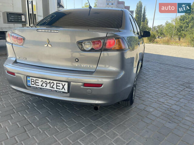 Серый Мицубиси Лансер, объемом двигателя 1.6 л и пробегом 183 тыс. км за 7400 $, фото 2 на Automoto.ua