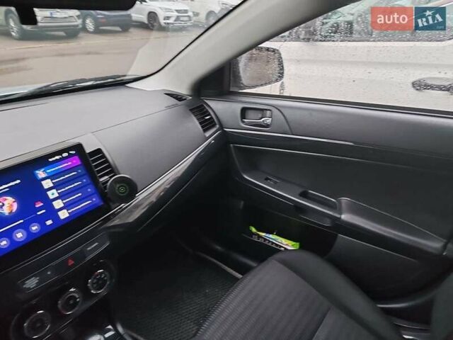 Серый Мицубиси Лансер, объемом двигателя 1.6 л и пробегом 212 тыс. км за 8619 $, фото 5 на Automoto.ua