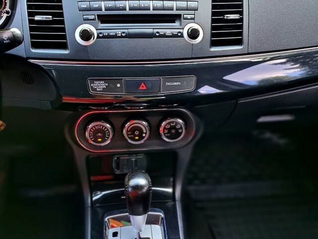 Сірий Міцубісі Lancer, об'ємом двигуна 1.8 л та пробігом 115 тис. км за 8200 $, фото 9 на Automoto.ua