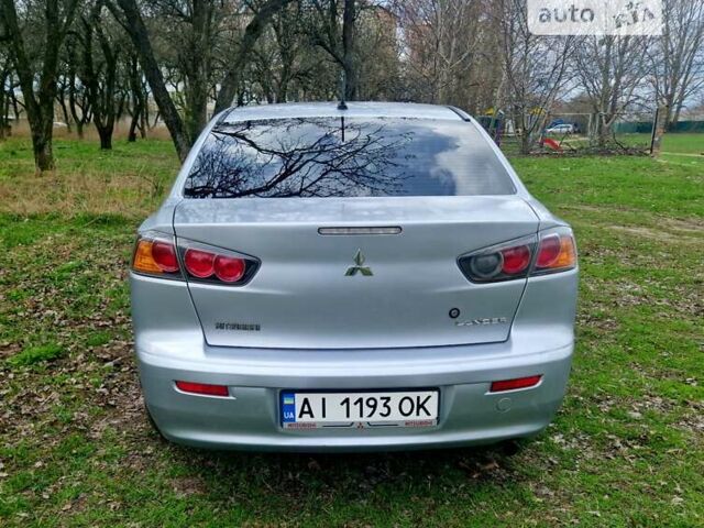 Сірий Міцубісі Lancer, об'ємом двигуна 1.6 л та пробігом 249 тис. км за 6300 $, фото 4 на Automoto.ua