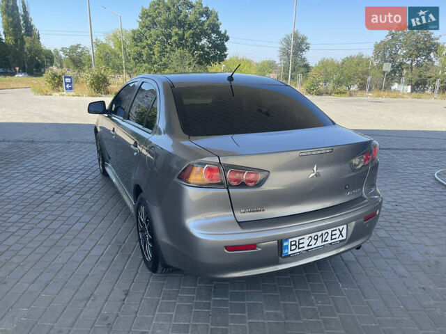 Серый Мицубиси Лансер, объемом двигателя 1.6 л и пробегом 183 тыс. км за 7400 $, фото 4 на Automoto.ua