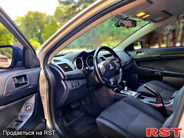 Сірий Міцубісі Lancer, об'ємом двигуна 1.8 л та пробігом 115 тис. км за 8200 $, фото 8 на Automoto.ua
