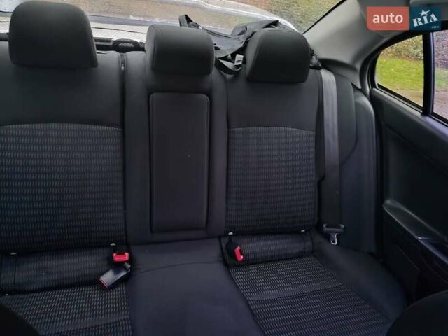 Серый Мицубиси Лансер, объемом двигателя 1.6 л и пробегом 212 тыс. км за 8619 $, фото 4 на Automoto.ua